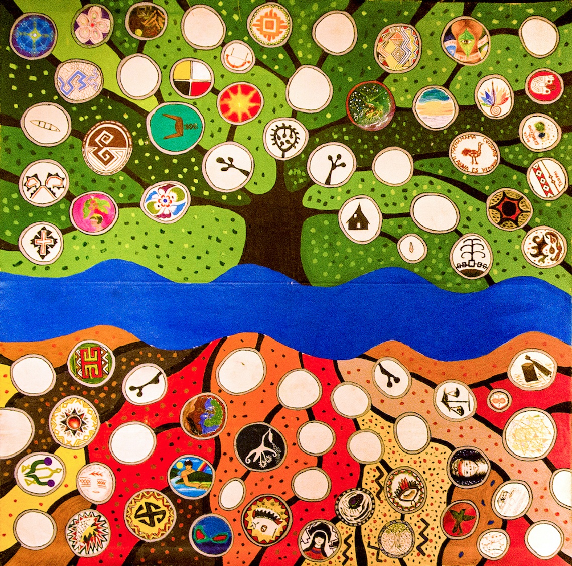 Green blue and red ground with tree limbs and circles throughout