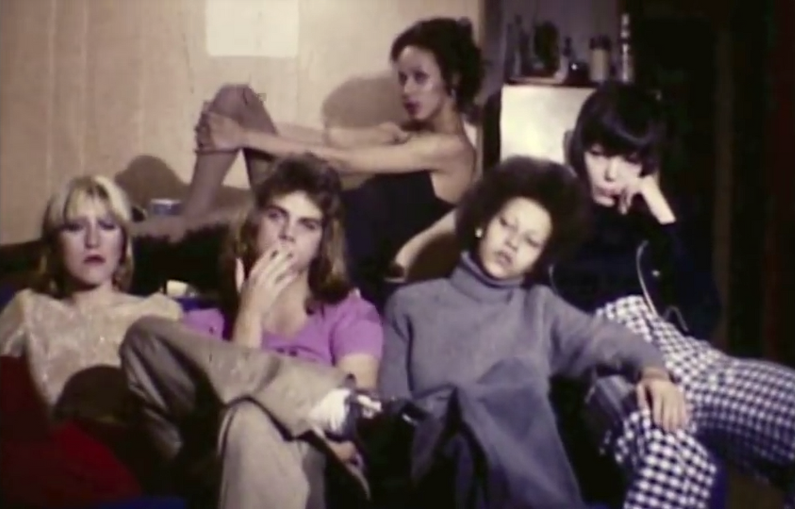 group of people lounging on a couch